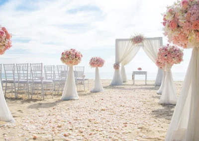 A wedding with roses on the beach in Costa Rica